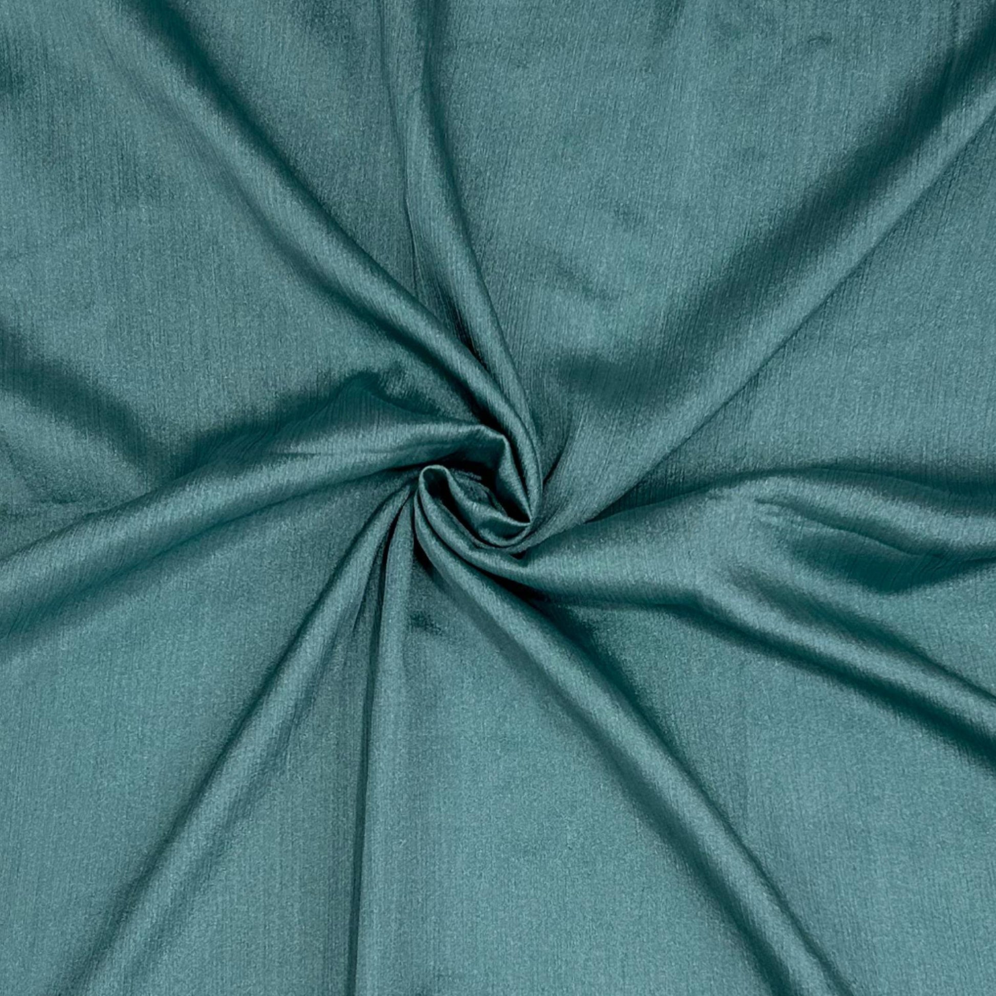 Teal fabric with a pleated texture