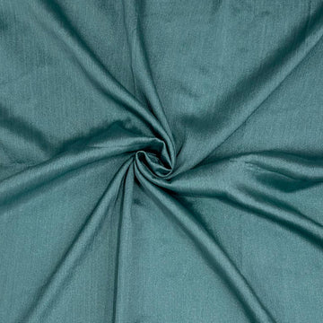 Teal fabric with a pleated texture
