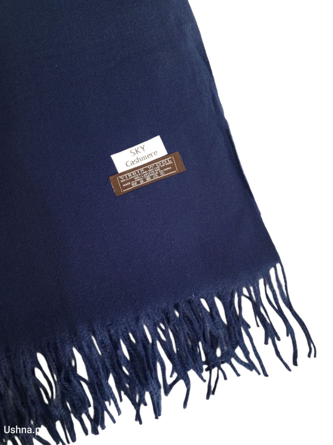 Navy Blue Shawl with a brand label on a white background.